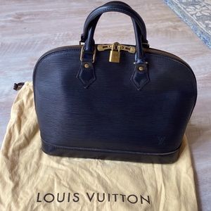 Louis Vuitton authentic black Alma PM handbag.   Black leather w gold hardware